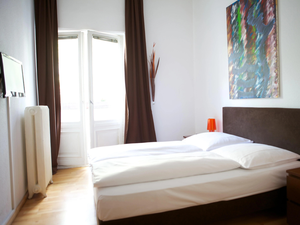 Tom's Hotel - Chambres