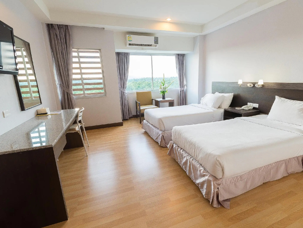 Sinkiat Buri Hotel - Chambres