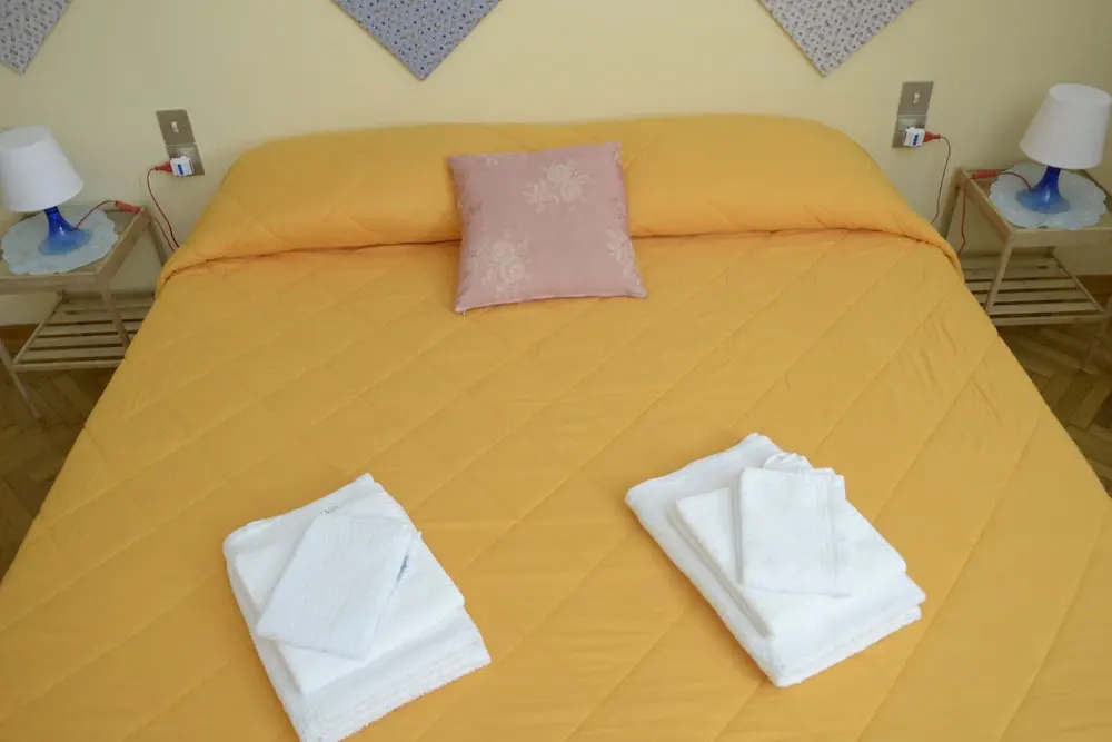 Standard Quadruple room with balcony and with garden view