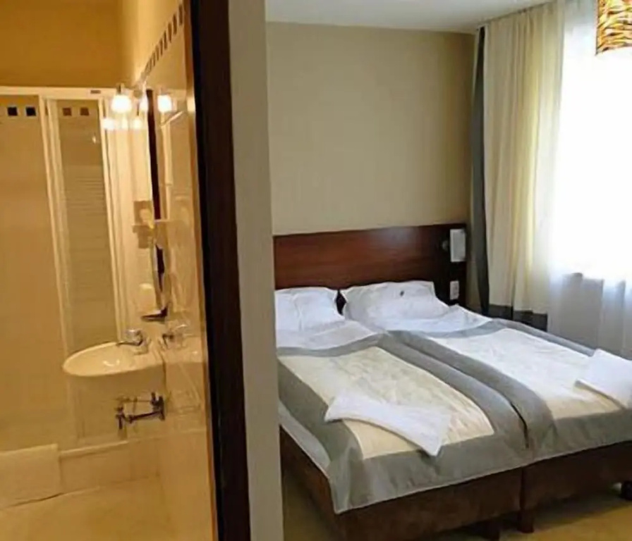 Atrium Hotel - Chambres