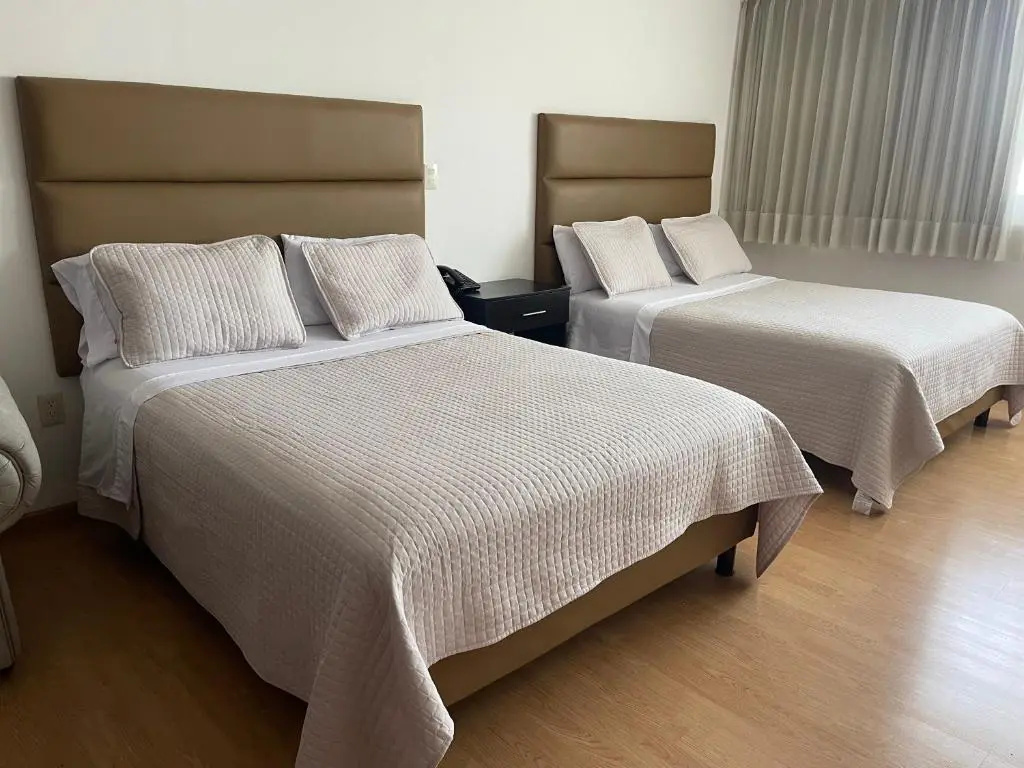 My Home Suites - Chambres