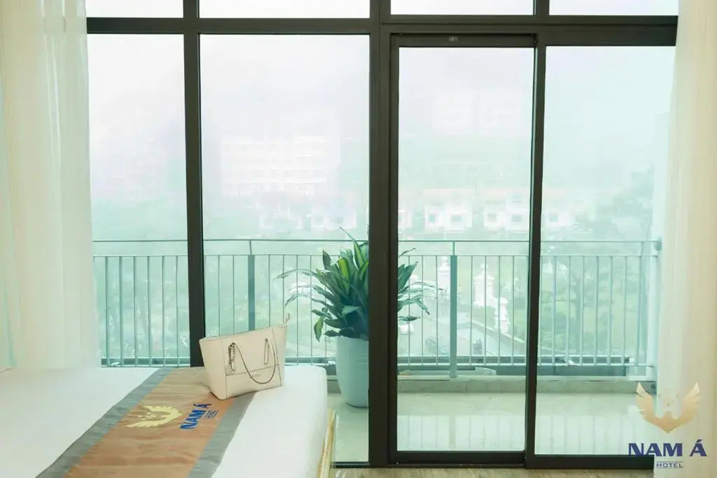 Nam A Hotel - Chambres