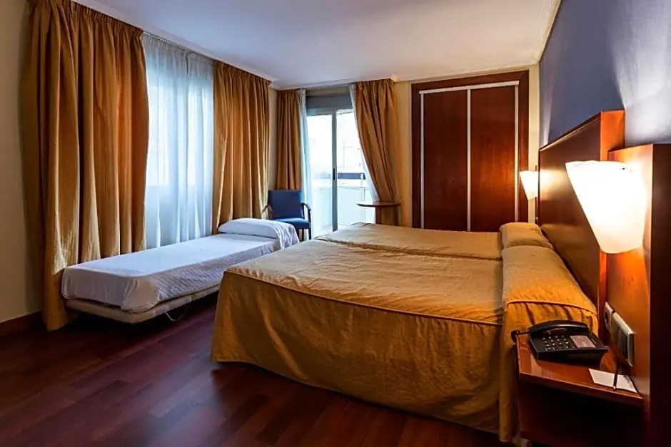 Torreluz Centro Hotel - Chambres