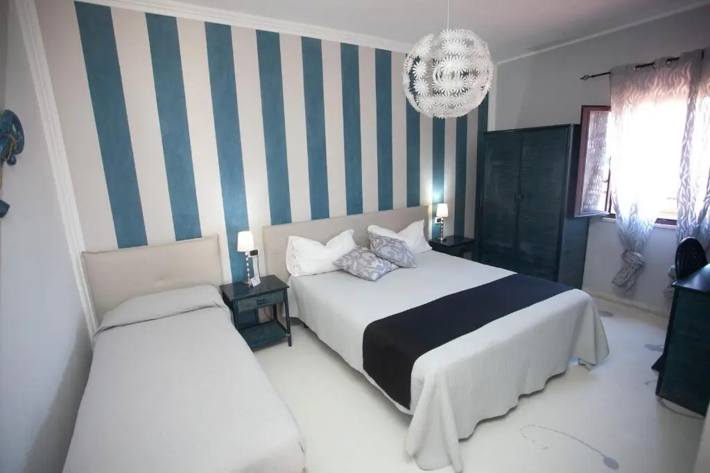 Standard Quadruple room with sea view