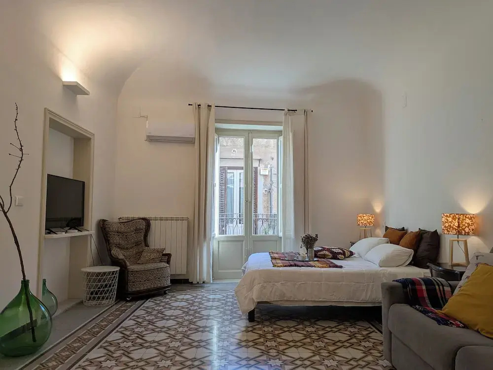 Standard Quadruple room with balcony and with city view