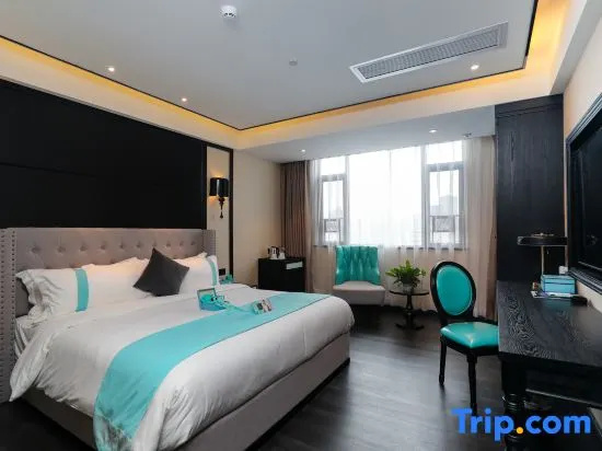 Xinliyuan Hotel - Chambres