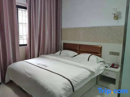 Huayun Hotel - Chambres