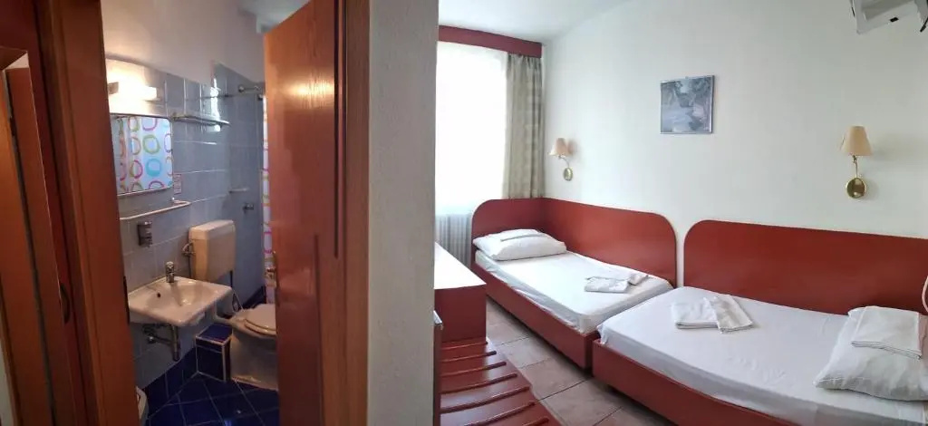 Nap Hotel - Chambres