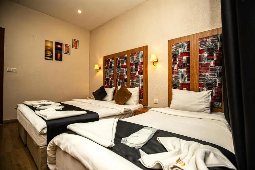 La Pazza Suites Hotel - Chambres