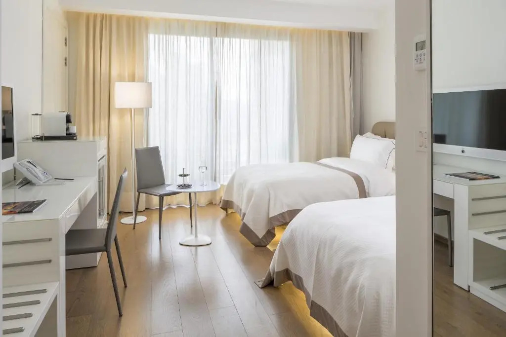 O Monot Hotel - Chambres