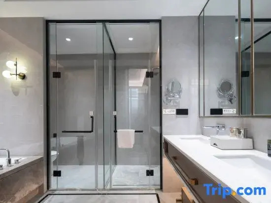 Xinli Hotel - Chambres