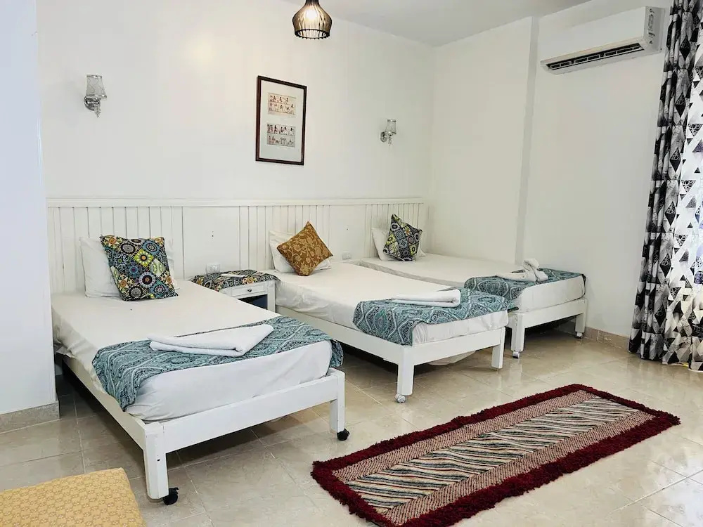 Deluxe Triple room with garden view
