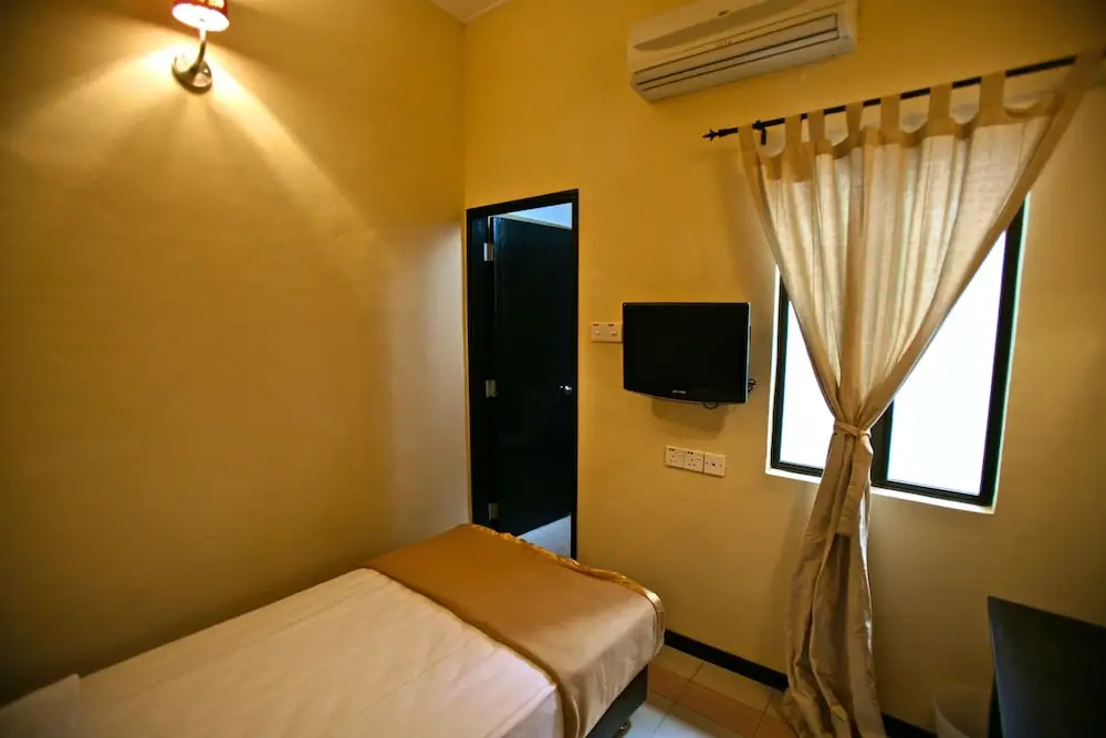 Etika Inn - Chambres