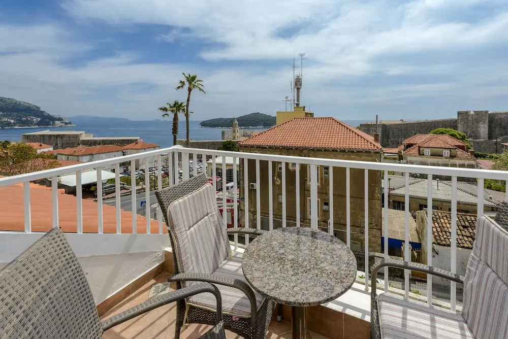 Superior Triple room with balcony and with sea view
