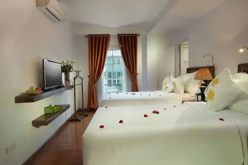 Singita Classy Boutique Hotel - Chambres
