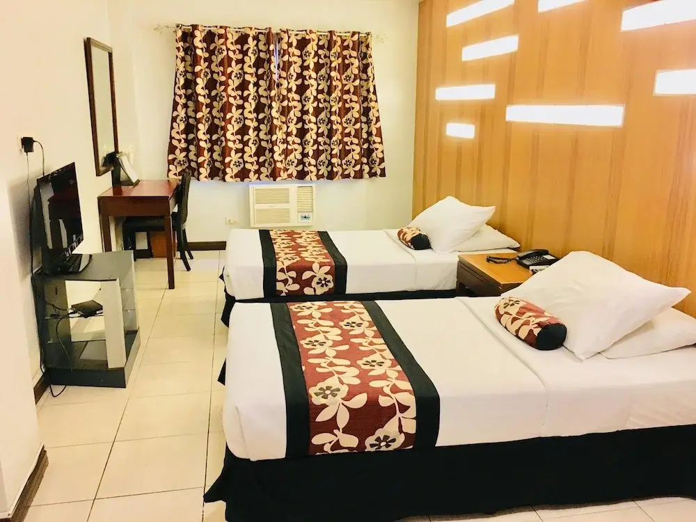 Jupiter Suites - Chambres