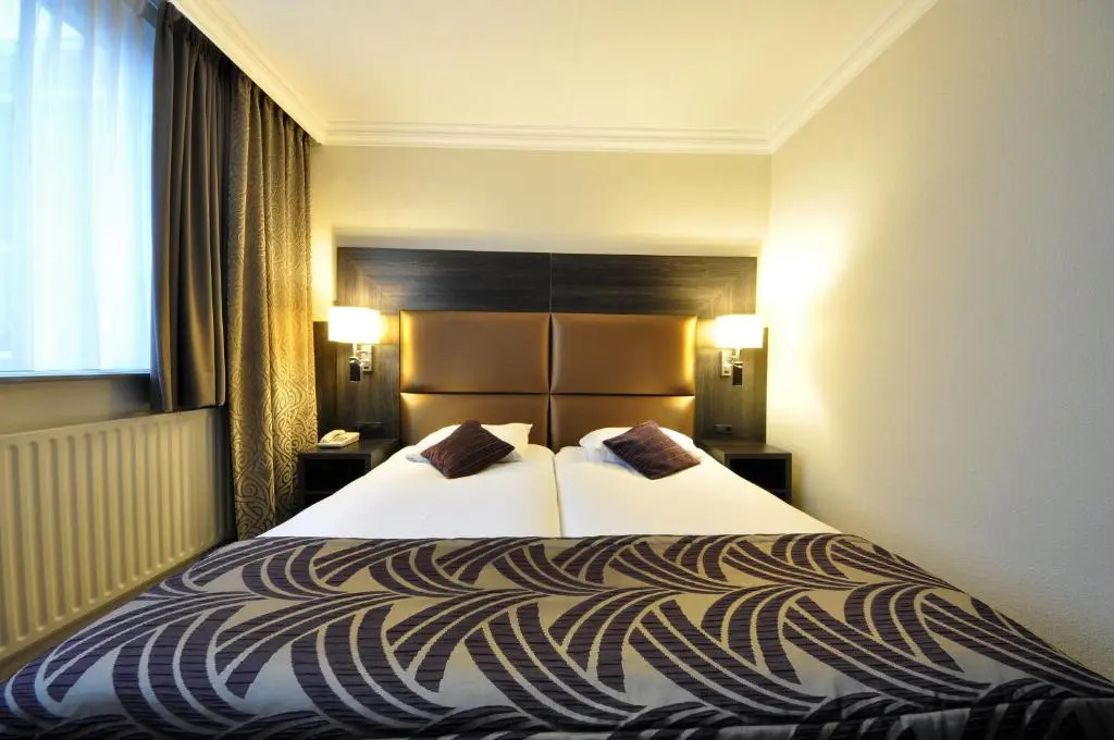 Grandcafé Hotel Terminus - Chambres
