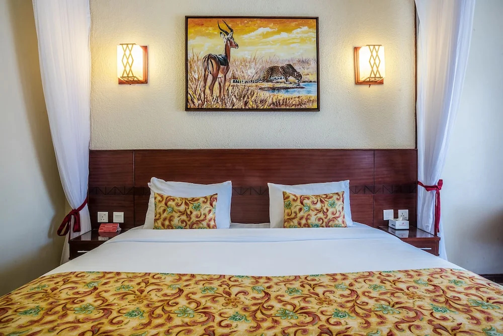PrideInn Hotel Raphta - Chambres