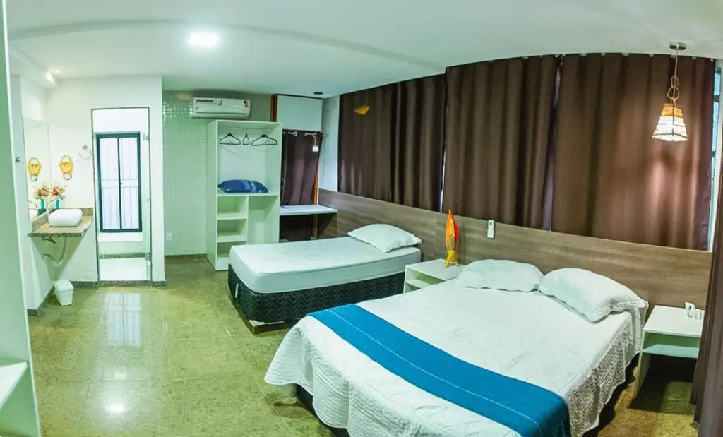 SEGUNDA CASA - Seu cantinho em Guarapari, 1 minuto a pé da Praia do Morro! Suítes confortáveis e modernas - Para casal ou para grupos de até 5 pessoas