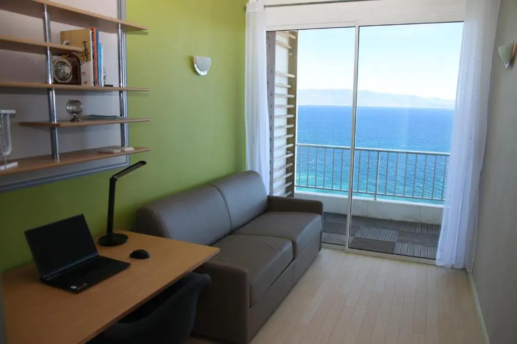 Voir la photo 3 — Flat with panoramic view of the Gulf of Ajaccio.