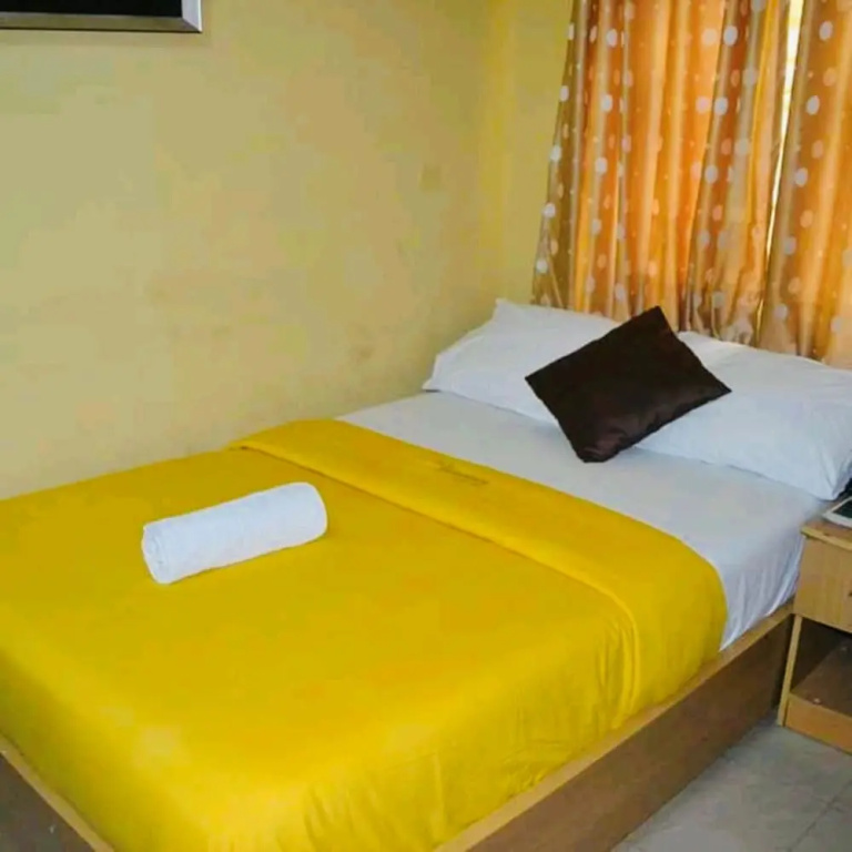 De Lawrence Court & Suites - Chambres