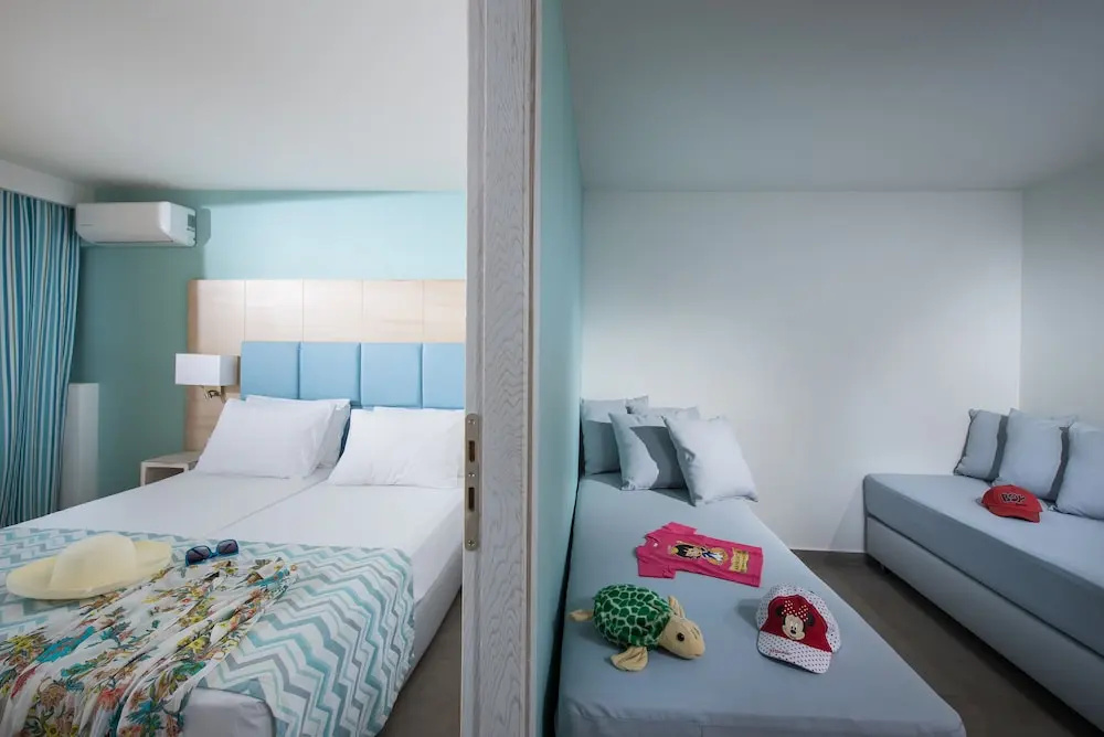 Superior Family Suite with balcony and with garden view
