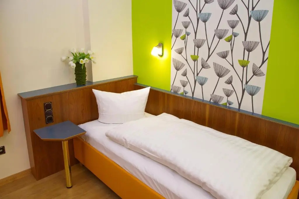 Stadtcafé Hotel Garni - Chambres