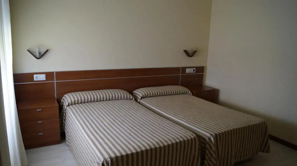 Hostal A Camelia - Chambres
