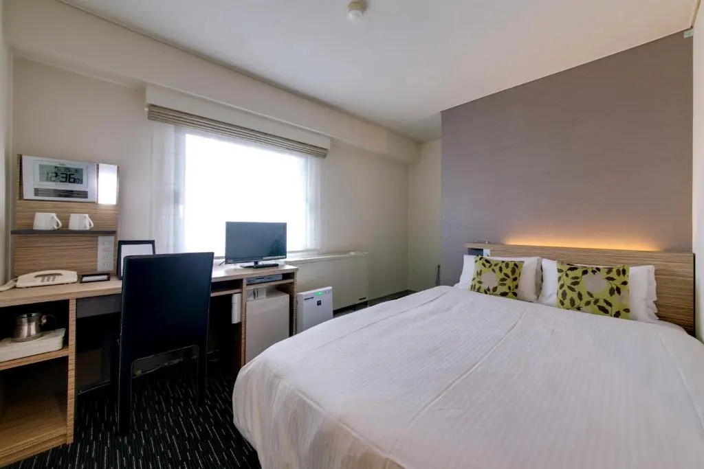 Plaza Hotel Toyota - Chambres