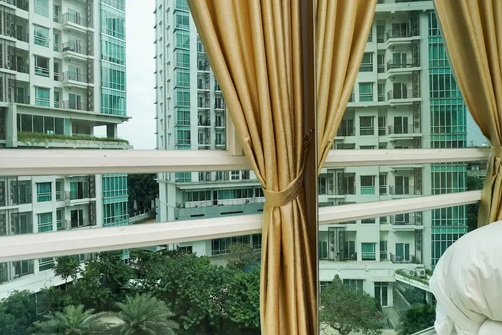 2BR Apartment with Sofa Bed at Woodland Park Residence By Travelio