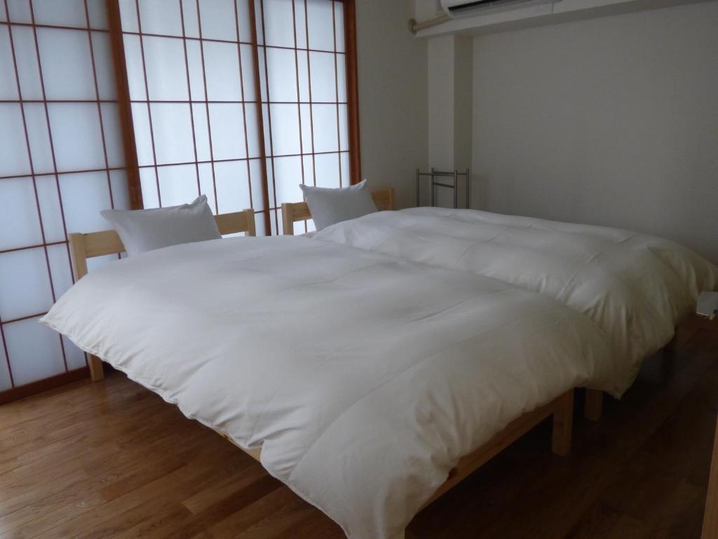 Guesthouse Hyakumanben Cross 사진 8