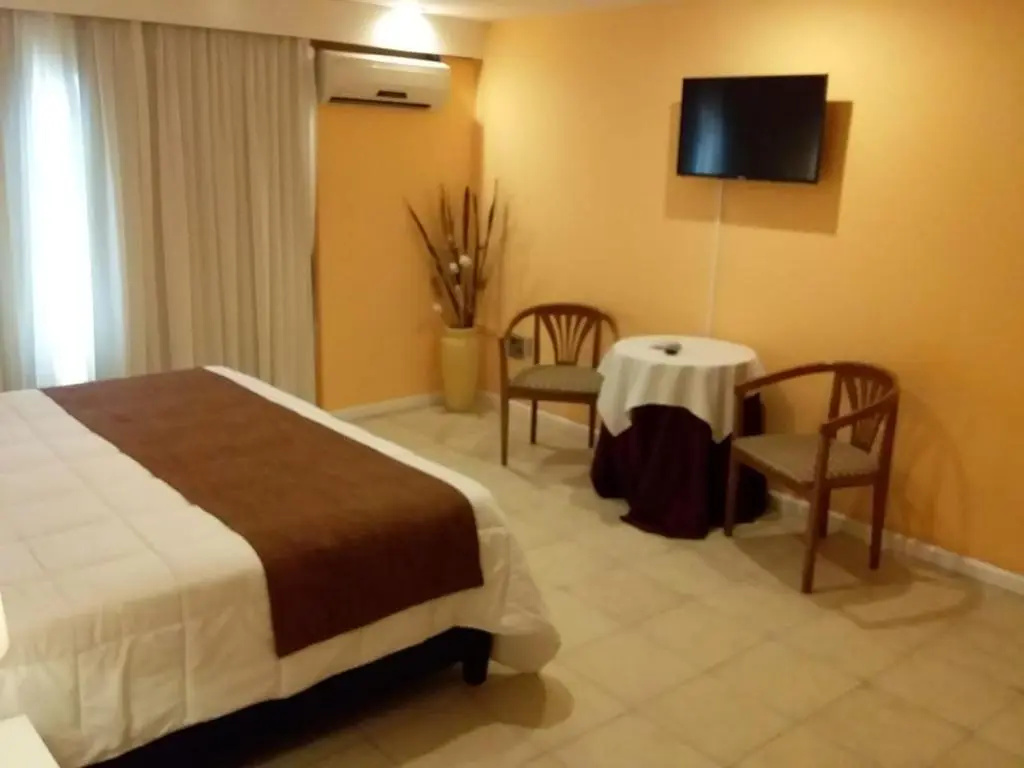Nuevo Hotel Plaza - Chambres
