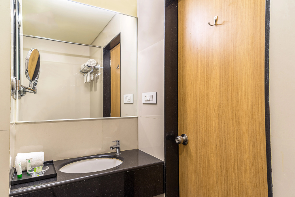 Treebo Premium Grand Emerald - Chambres