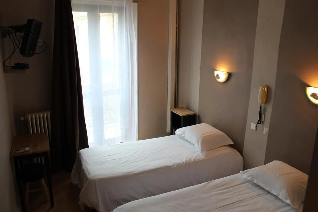 Standard Quadruple room with courtyard view