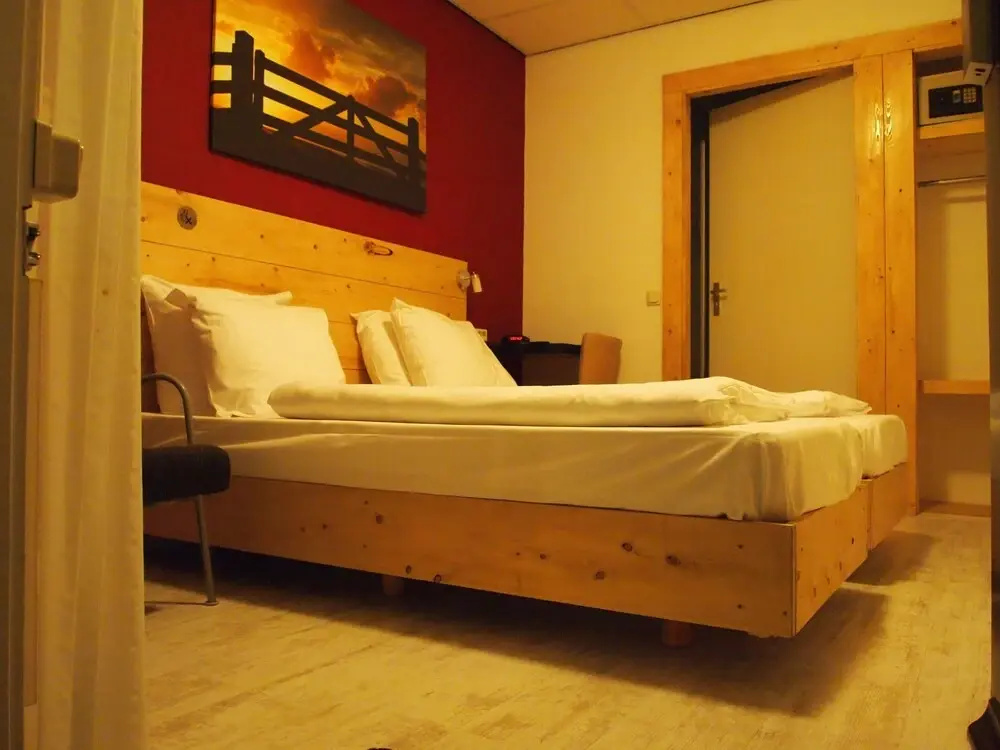 Hotel De Stadsherberg - Chambres