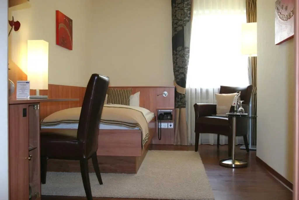 Hotel Merkur - Chambres