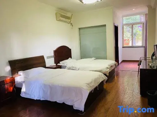 Xishu Sunshine Garden Hotel - Chambres