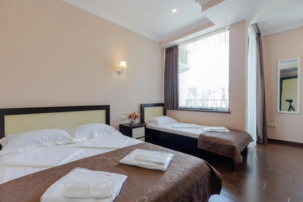 GNS Hotel - Chambres