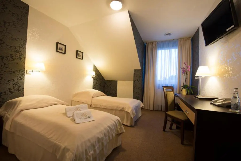 Hotel Cztery Pory Roku - Chambres