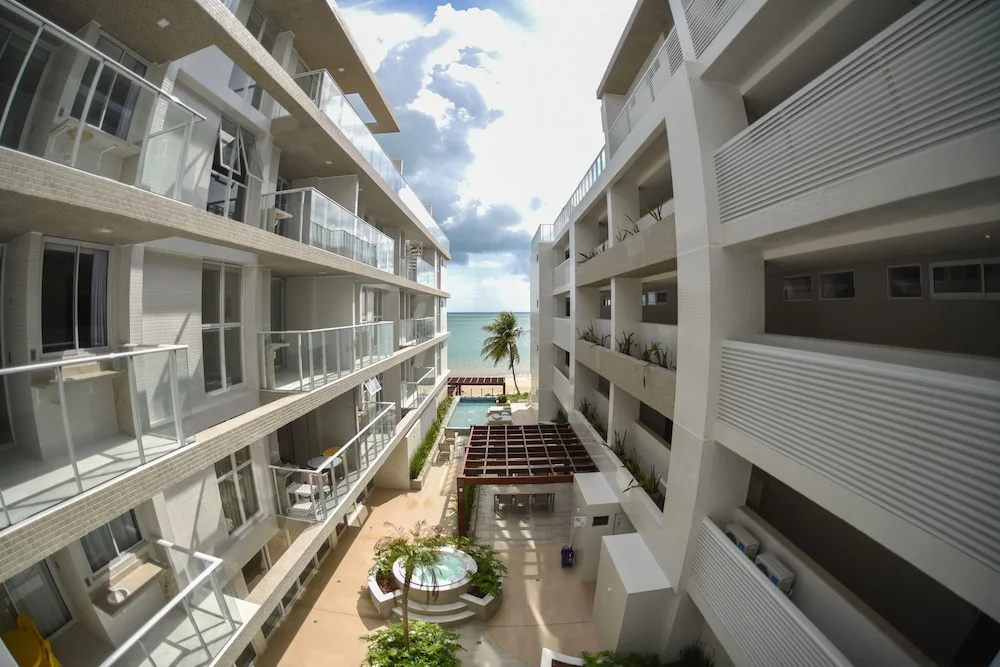 Pé na areia do Caribessa - Branco Haus