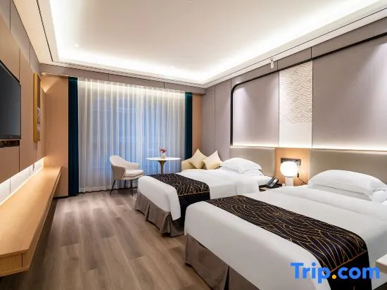 Huagang Hotel - Chambres
