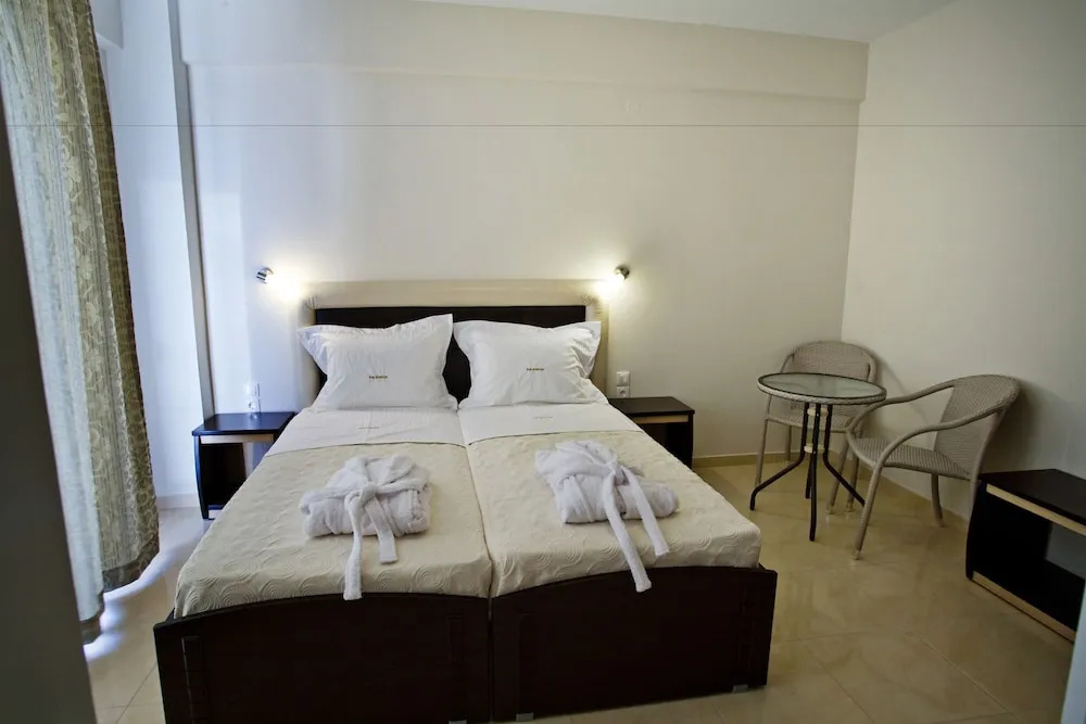 RG Status Hotel - Chambres