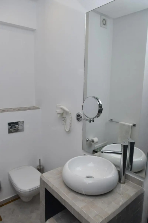 Amani Hotel Suites & Spa - Chambres