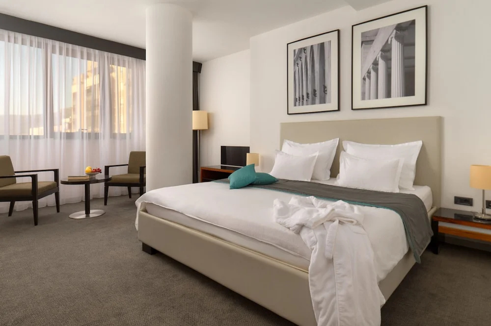 Atrium Hotel - Chambres