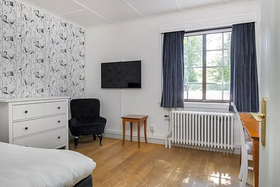 Hotel Gyllene Uttern - Chambres