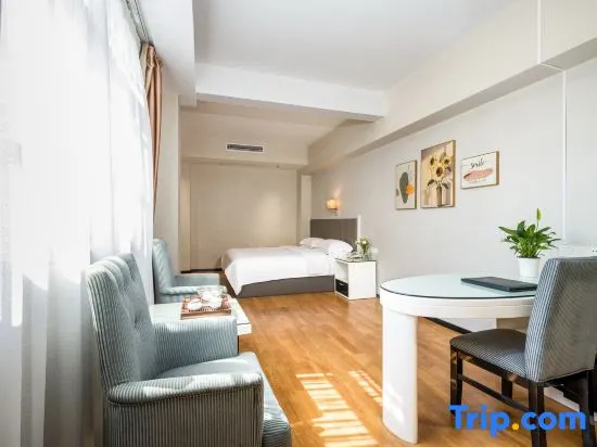 Jinyi Hotel - Chambres