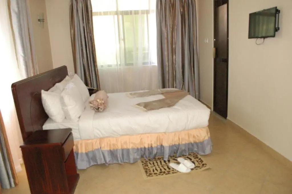 The Grace Land Hotel - Chambres