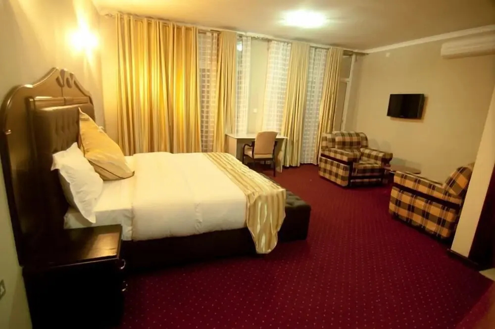 New Agena Hotel - Chambres