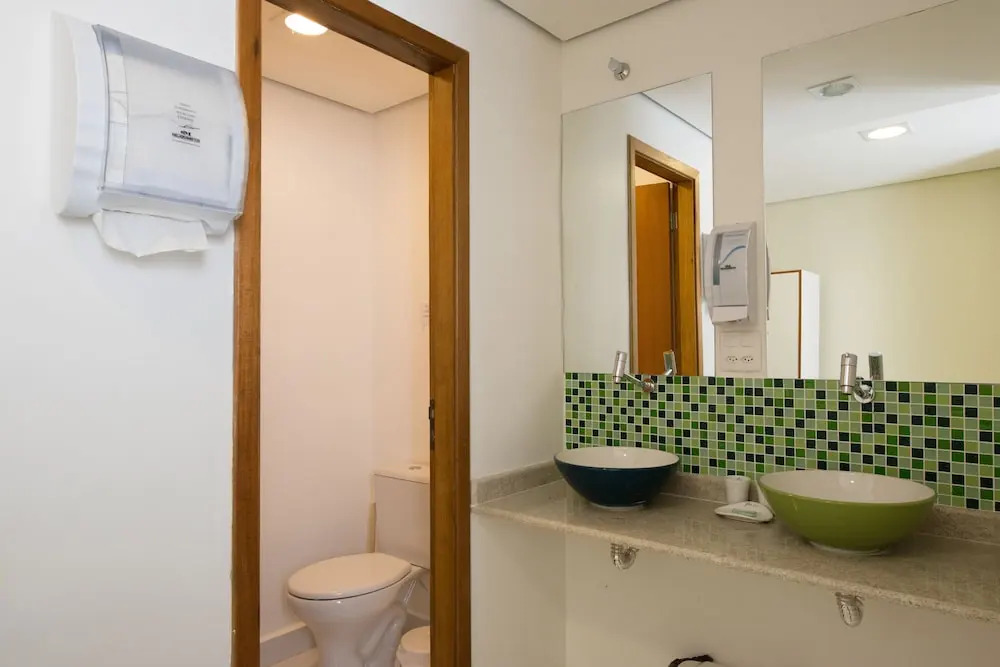 Кровать в общем номере в Brazilodge All Suites Hostel
