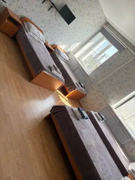 Кровать в общем номере в Колос